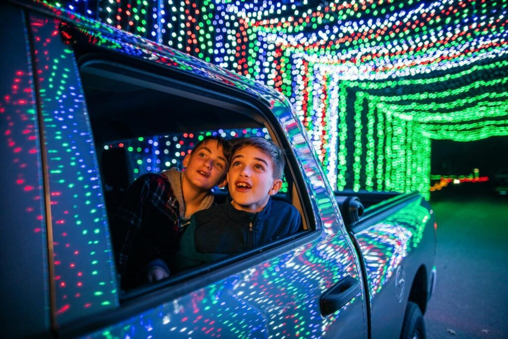 Family Driving Thru The Lights of Christmas